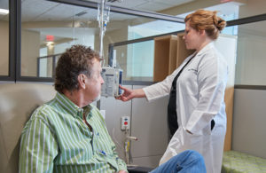 nurse and patient in IV infusion area